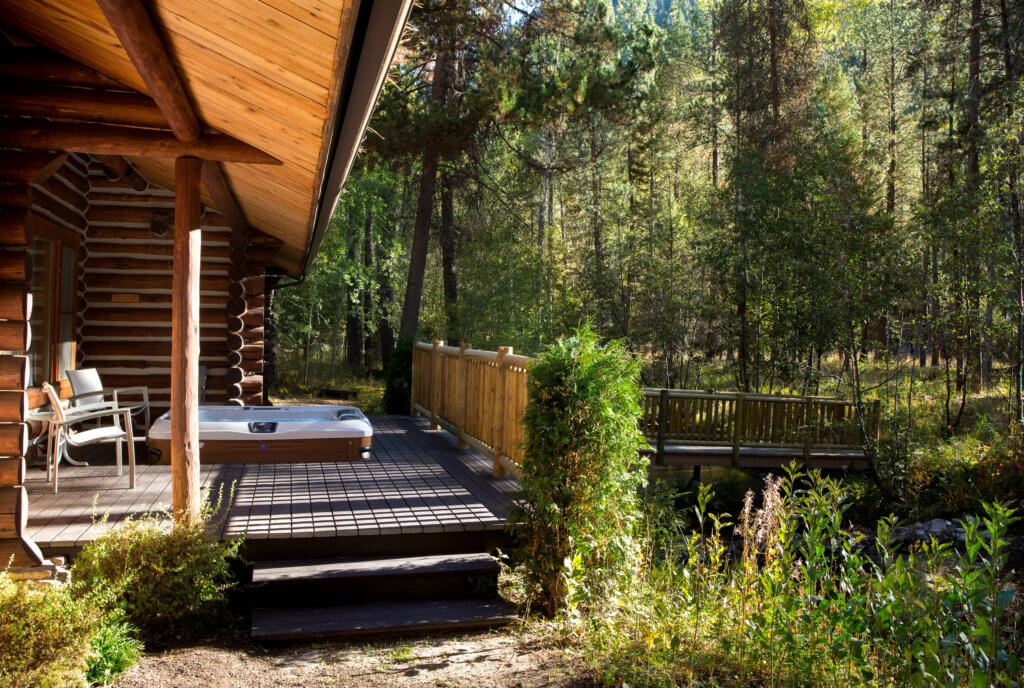 hot tub on cabin porch