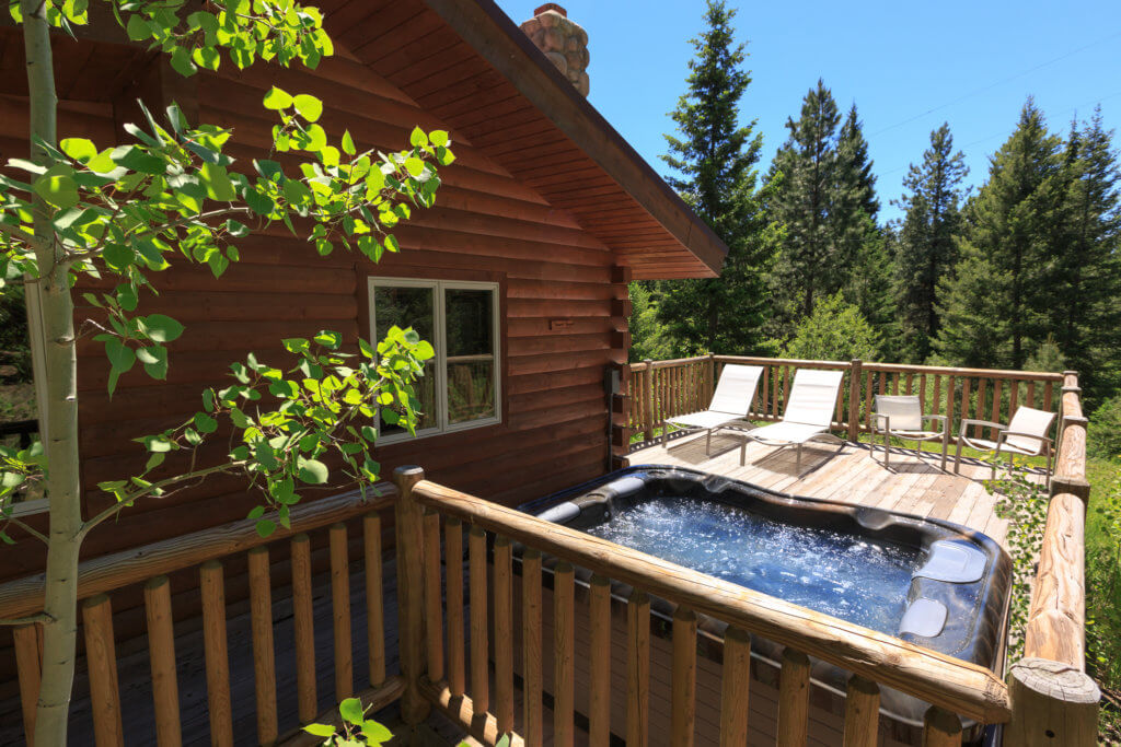 hot tub on cabin porch