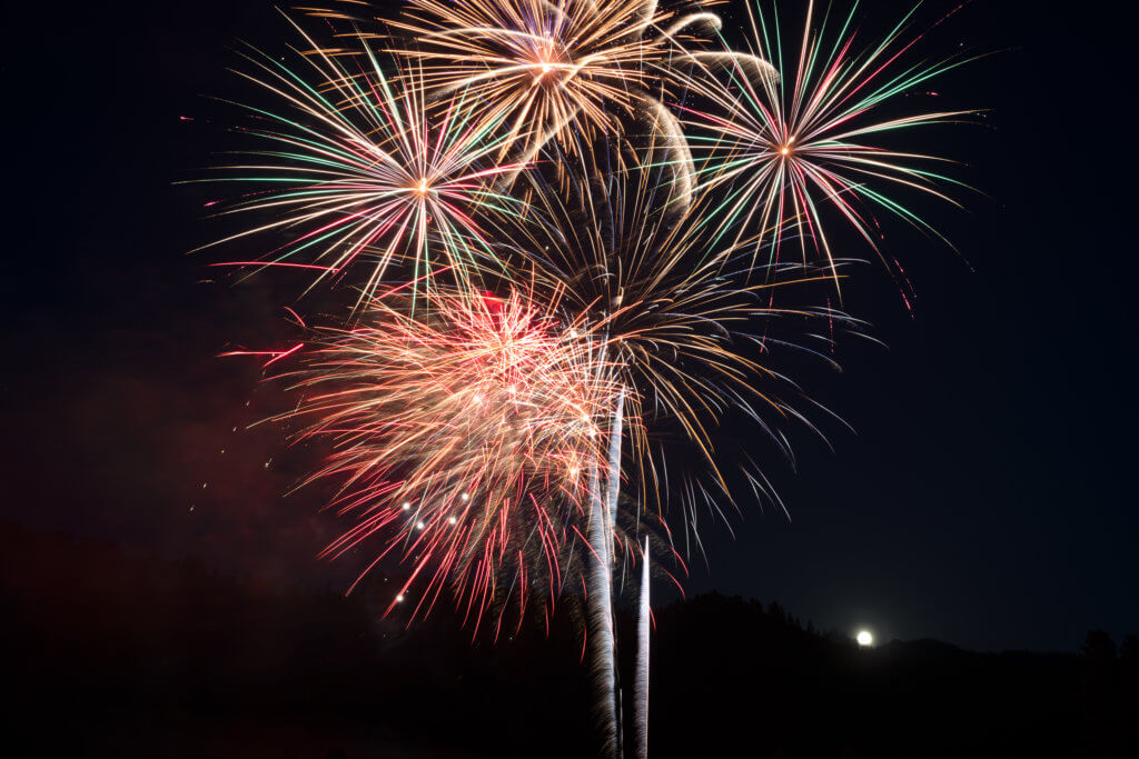 Fireworks on a moonlit night