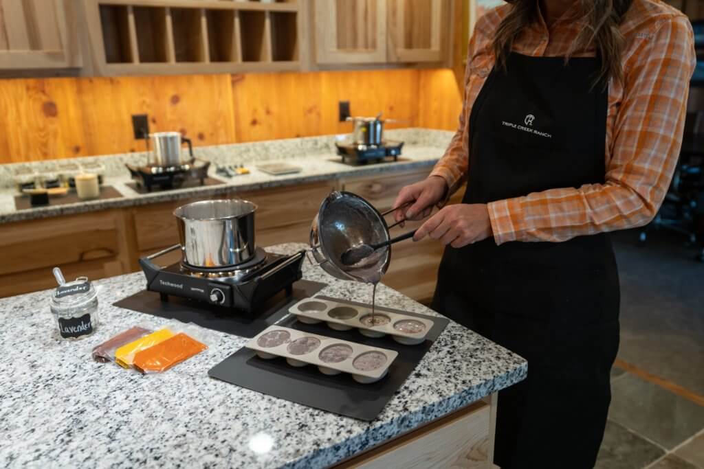 pouring soap into molds