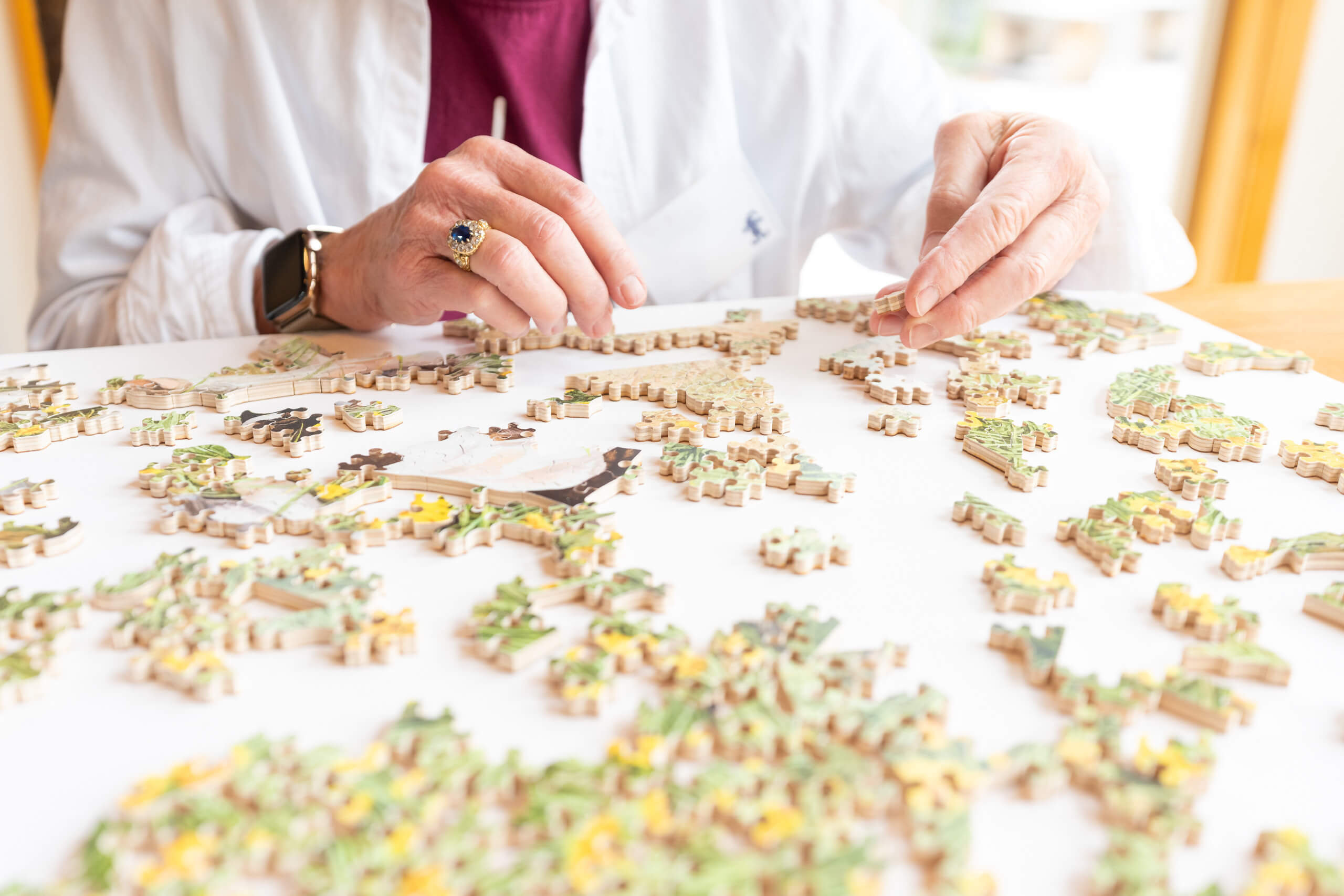 Guests piece together a stave puzzle in the ponderosa cabin