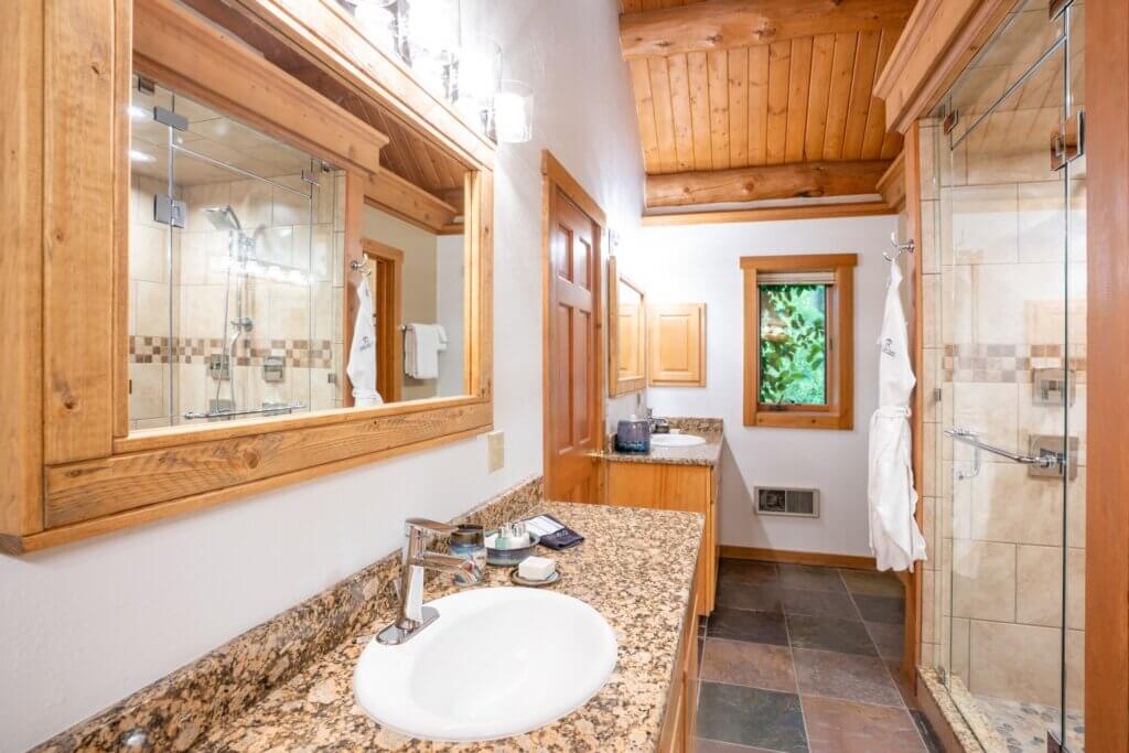 Bathroom with walk in steam shower in Stage Stop Cabin