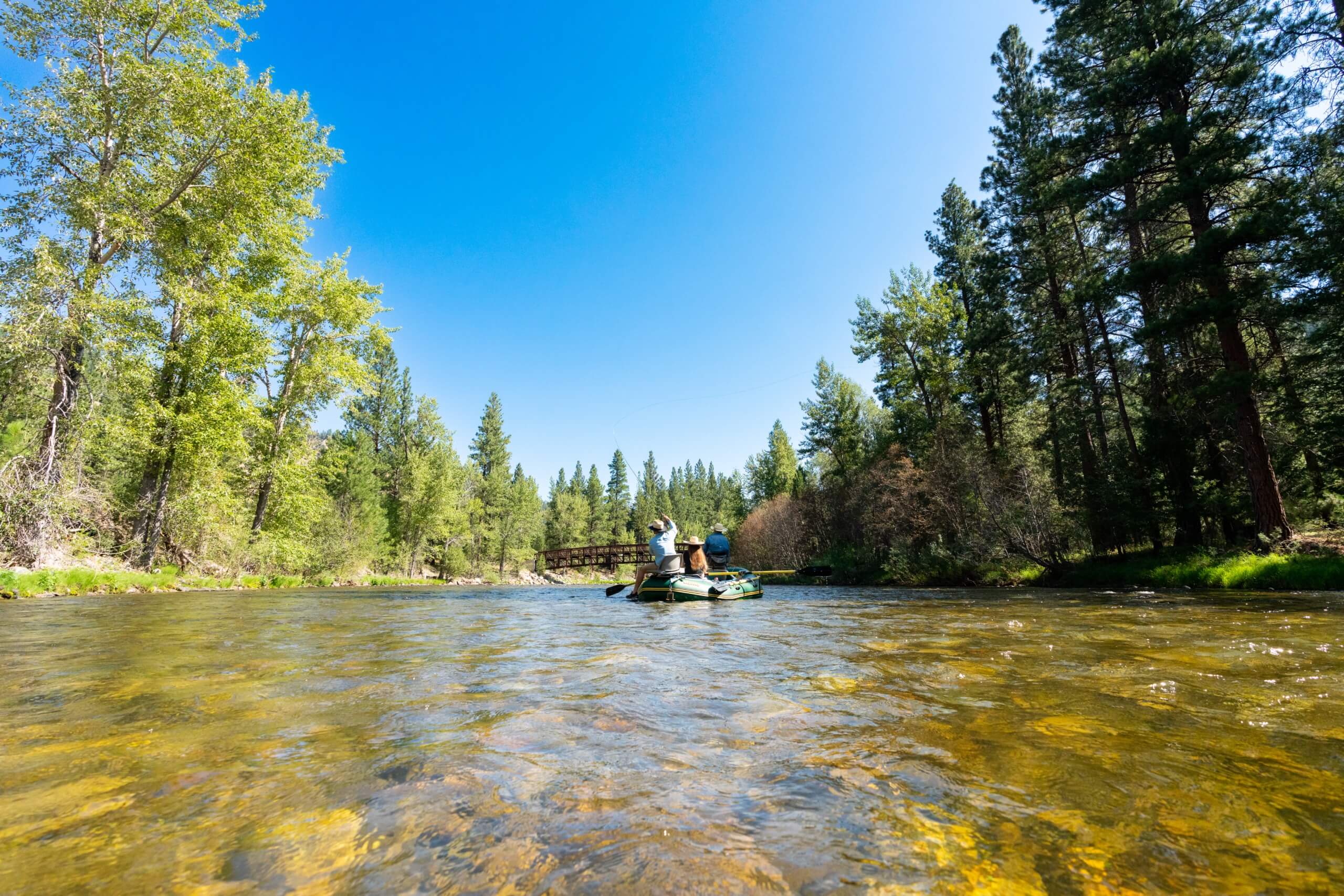 Guests Fly Fishing on the west fork river.