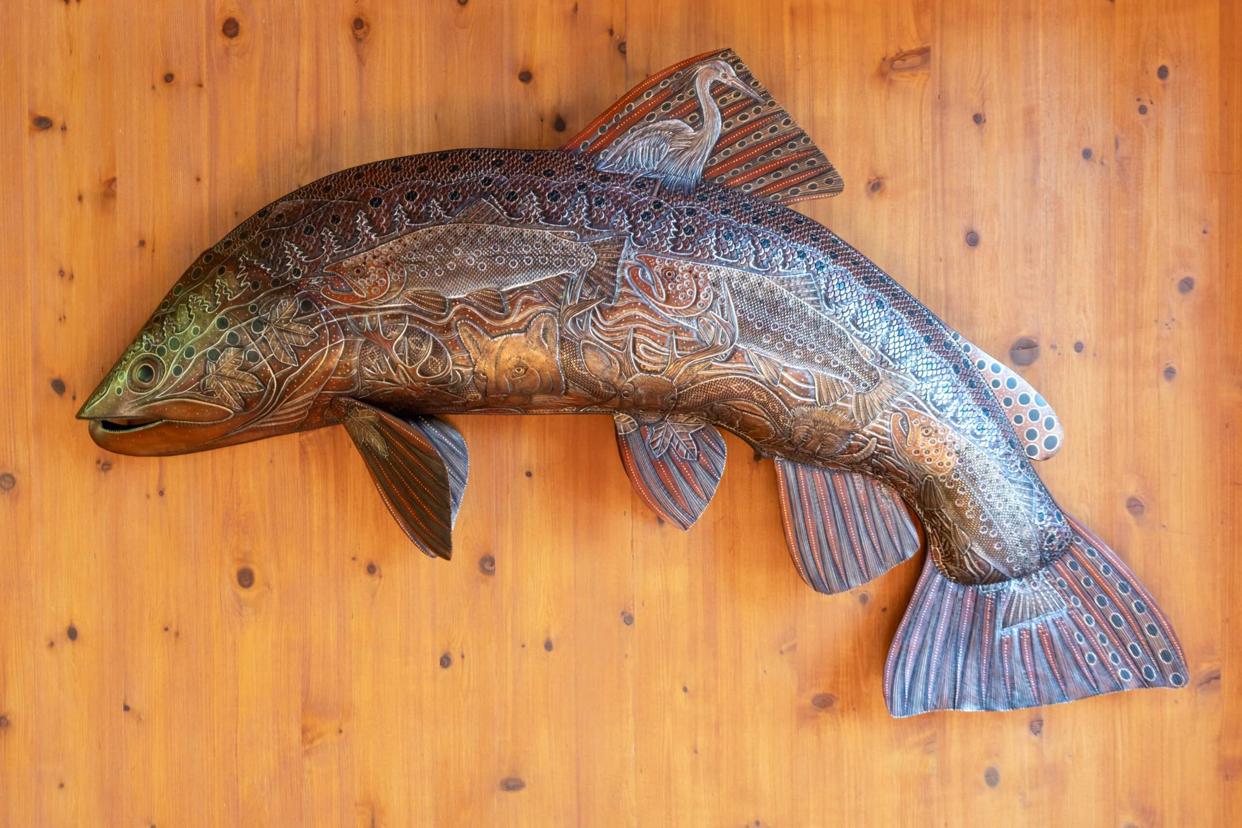 Fish art by Lance Boen hung on the wall at Triple Creek Ranch.