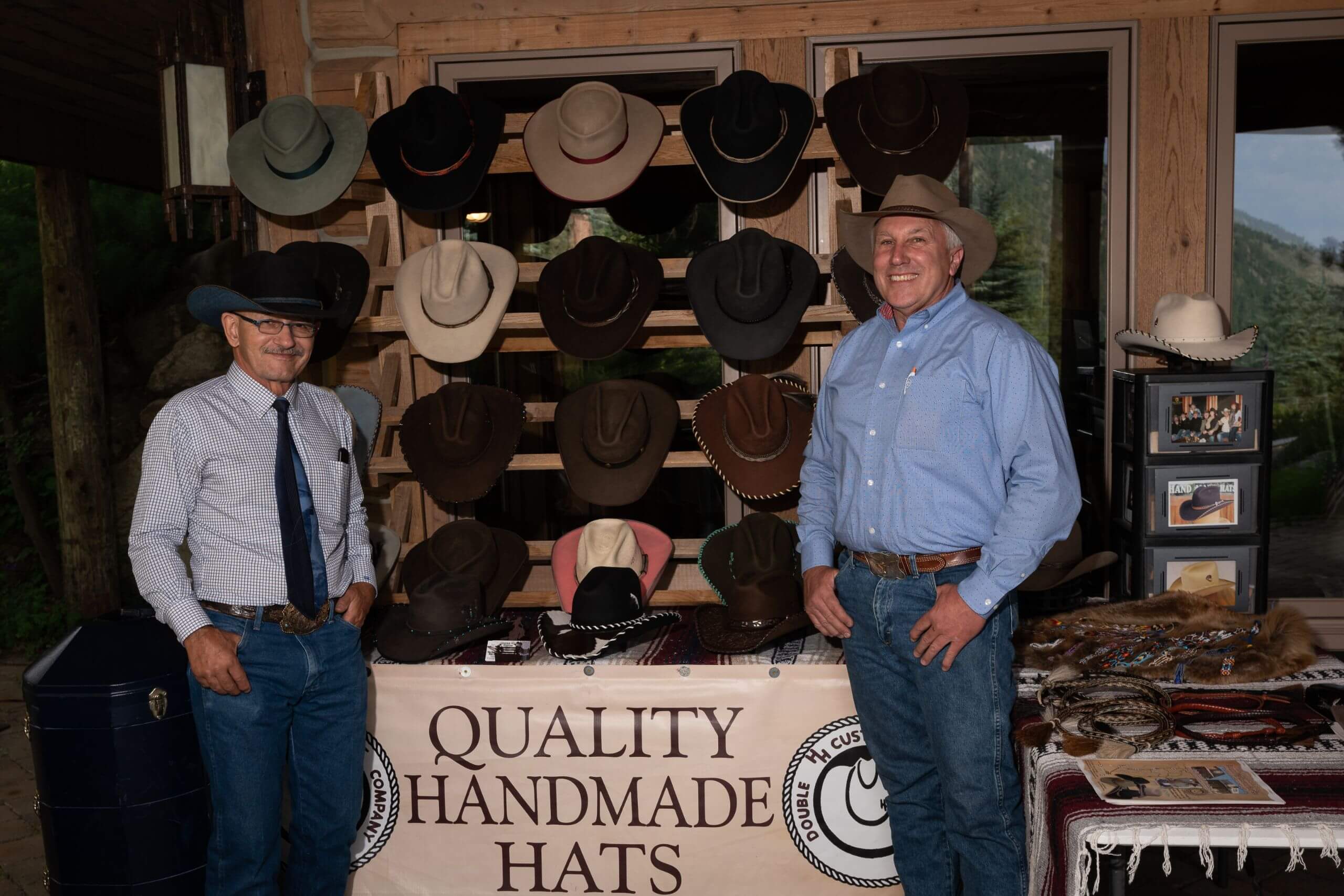 Display of cowboy hats and hat makers.