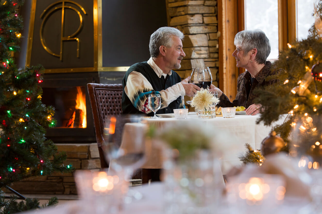 Dining Room Couple at Christmas enjoying gourmet cuisine