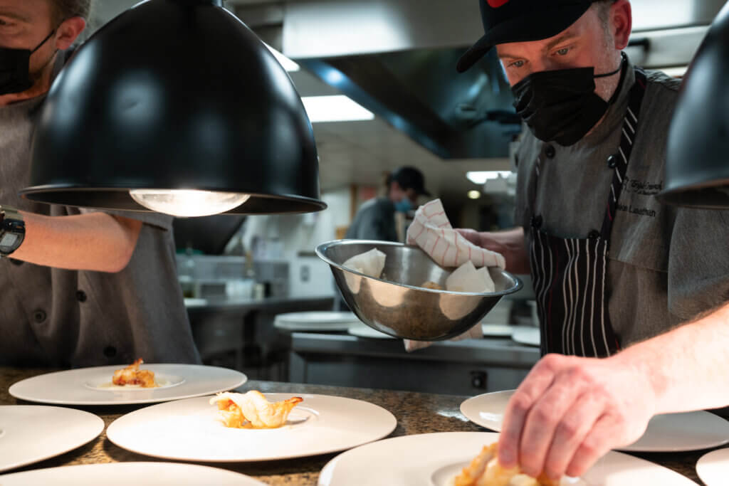 Chef Jake Plating Culinary Cuisine in the Kitchen