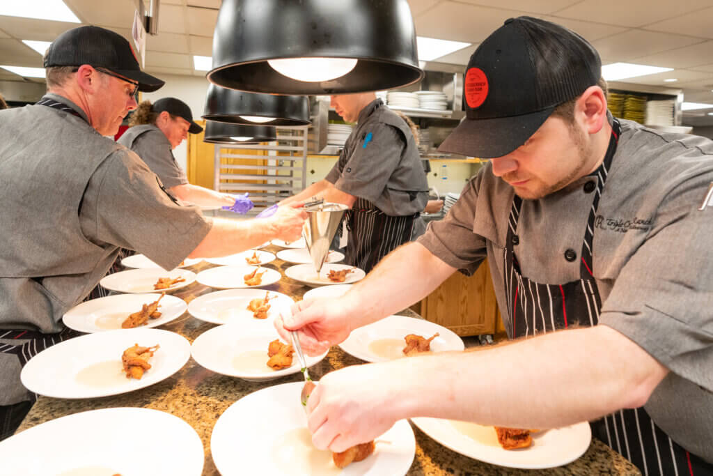 Chef Jake Plating Culinary Cuisine in the Kitchen