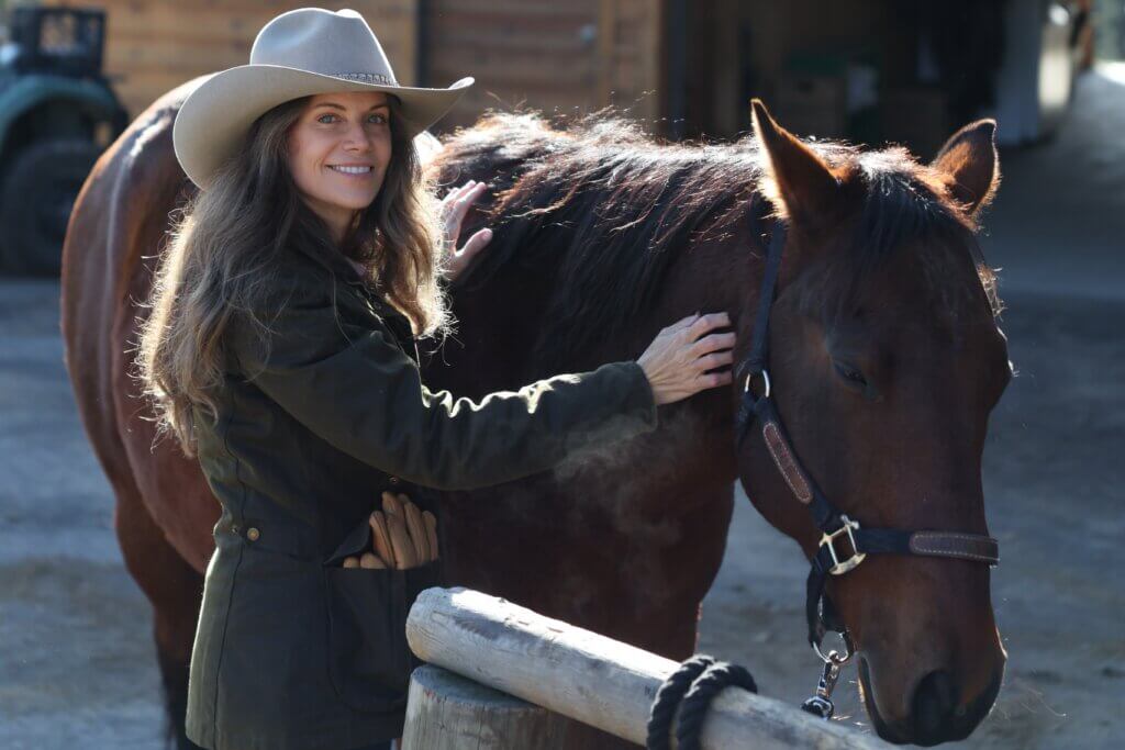 Triple Creek Ranch with horse for the annual Cowboy School Event